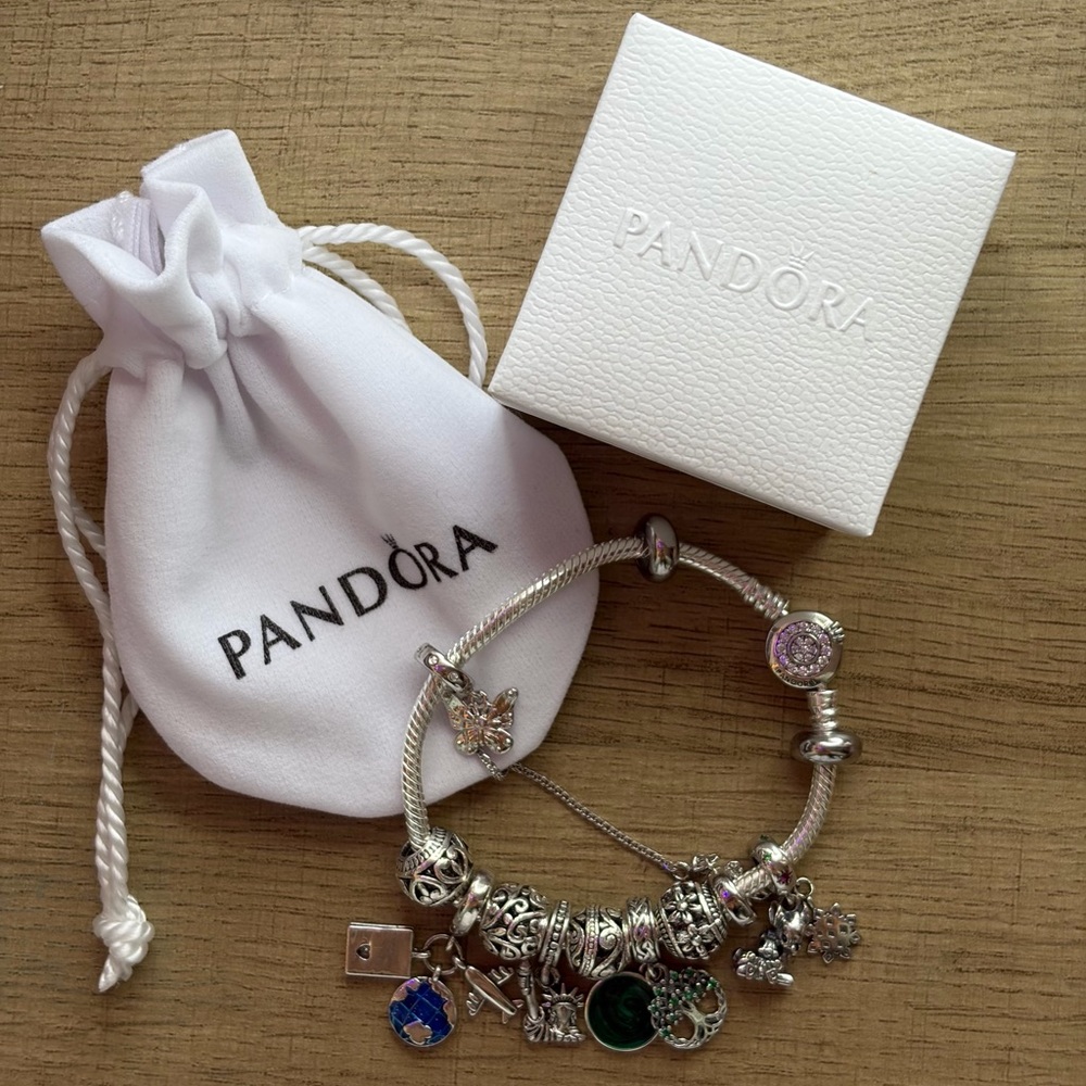 Authentic Pandora bracelet. Sterling silver. Full game.